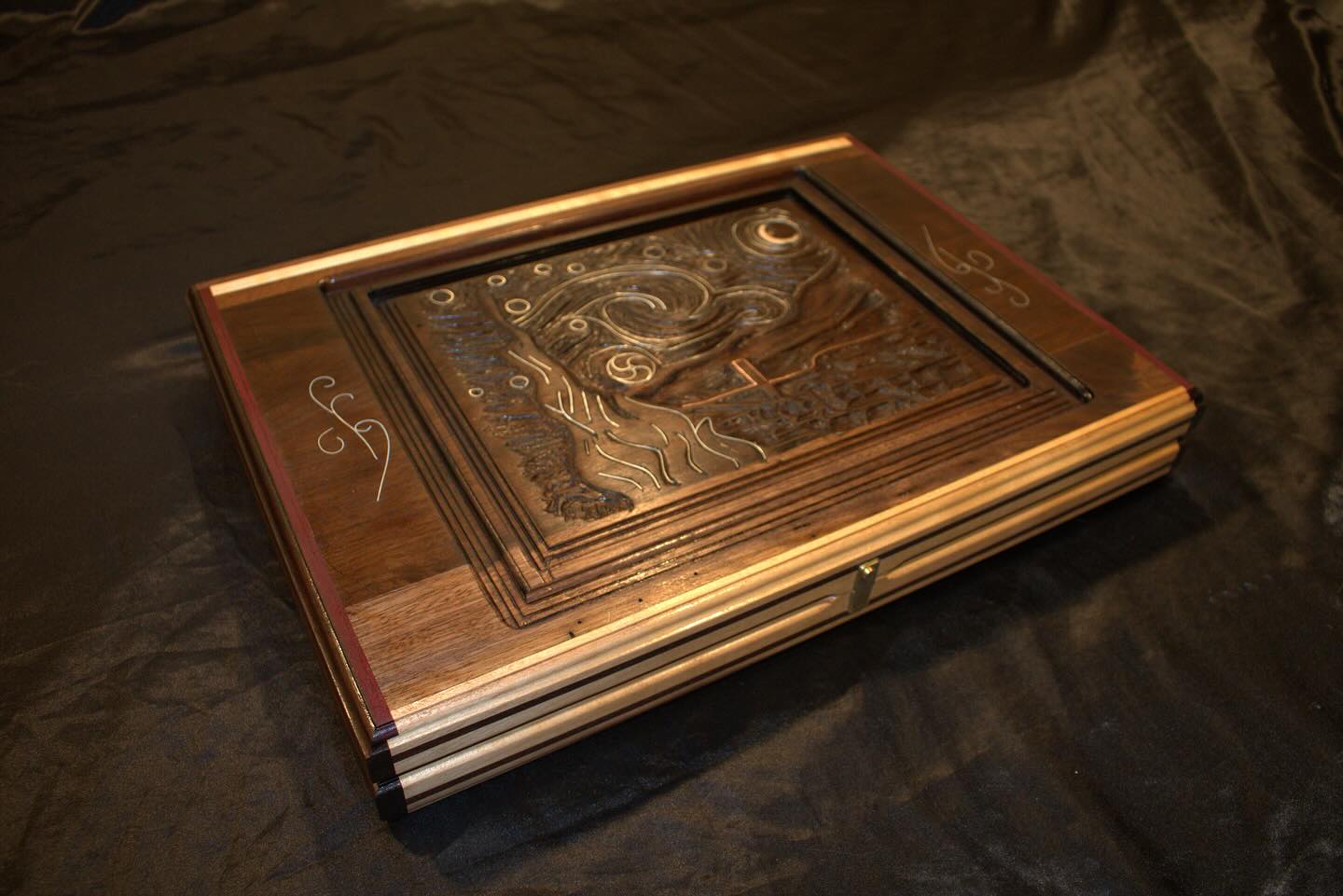 Ad Astra - Closed board showing Starry Night carving